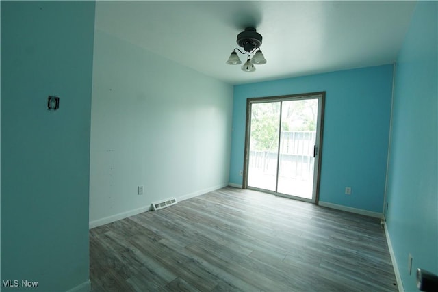 171 W Hiram St, Barberton, OH 44203 - spare room with wood finished floors and ceiling fan