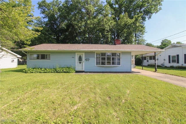 3886 Ascot Ct, Austintown, OH 44511 - ranch-style house featuring driveway, a front lawn, a chimney, and an attached carport