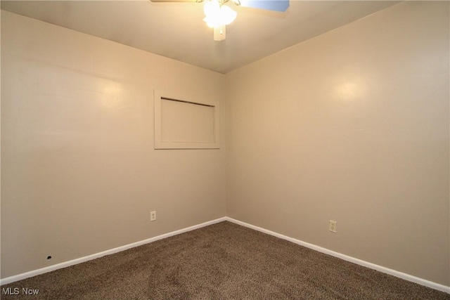 3886 Ascot Ct, Austintown, OH 44511 - spare room featuring dark carpet and a ceiling fan