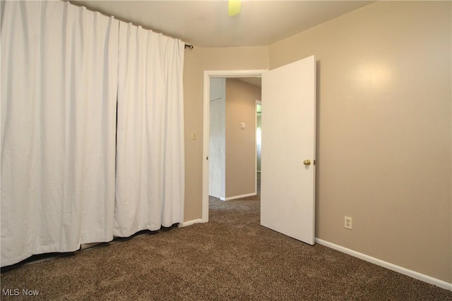 3886 Ascot Ct, Austintown, OH 44511 - unfurnished room featuring dark colored carpet and baseboards