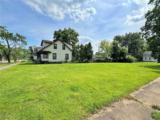 1307 W Ave, Elyria, OH 44035 - view of property exterior with a lawn