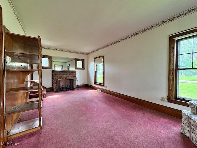 1307 W Ave, Elyria, OH 44035 - living area featuring carpet flooring and a fireplace with flush hearth