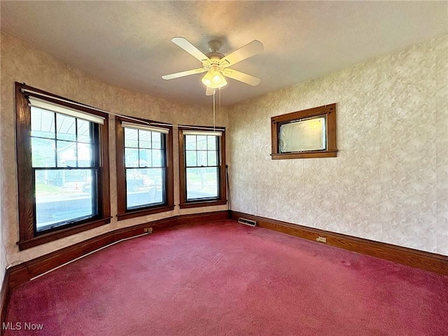 1307 W Ave, Elyria, OH 44035 - unfurnished room featuring dark carpet and ceiling fan
