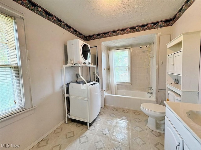 1307 W Ave, Elyria, OH 44035 - bathroom with vanity, a textured ceiling, and bathing tub / shower combination