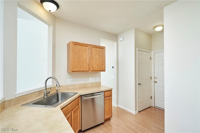 1435 Durham Dr, Broadview Heights, OH 44147 - kitchen with stainless steel dishwasher, light wood-type flooring, and light countertops