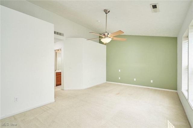 1435 Durham Dr, Broadview Heights, OH 44147 - unfurnished room featuring vaulted ceiling, ceiling fan, and light colored carpet