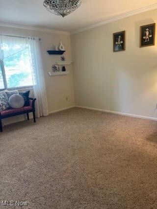 82 Silver Valley Blvd, Munroe Falls, OH 44262 - carpeted spare room with ornamental molding and baseboards