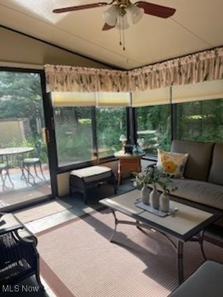 82 Silver Valley Blvd, Munroe Falls, OH 44262 - sunroom with vaulted ceiling, ceiling fan, and an outdoor hangout area