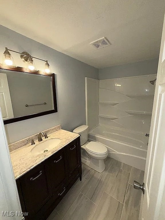 9630 Cove Dr Unit A14, North Royalton, OH 44133 - full bath with vanity and shower / bath combination