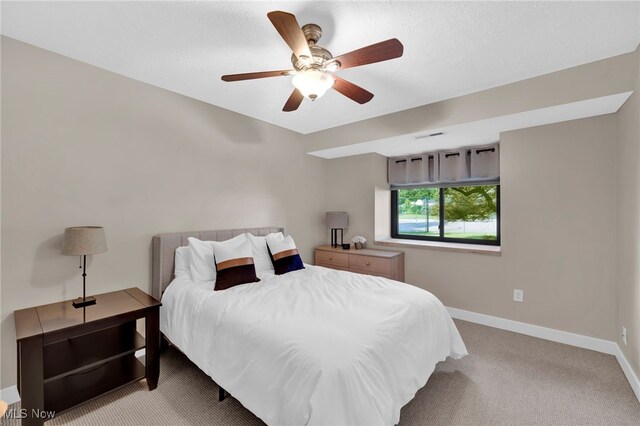 2910 N Bay Dr Unit L11, Westlake, OH 44145 - bedroom featuring carpet floors and a ceiling fan