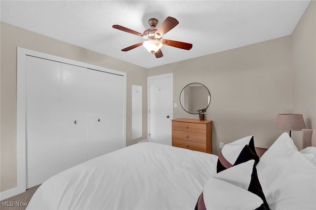 2910 N Bay Dr Unit L11, Westlake, OH 44145 - carpeted bedroom featuring a closet and a ceiling fan