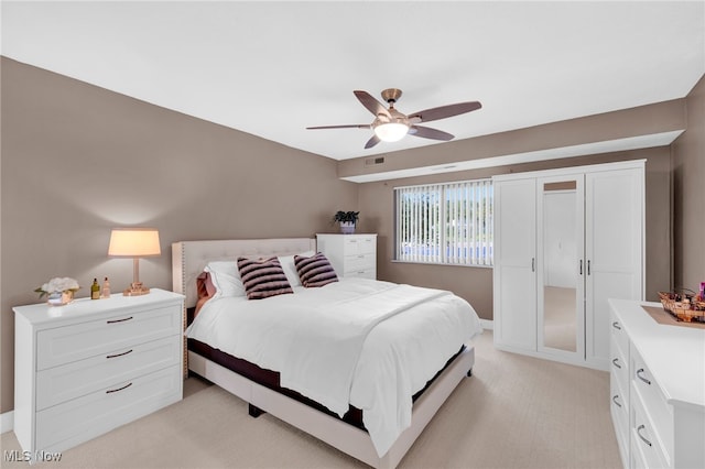 2910 N Bay Dr Unit L11, Westlake, OH 44145 - bedroom with light colored carpet and ceiling fan