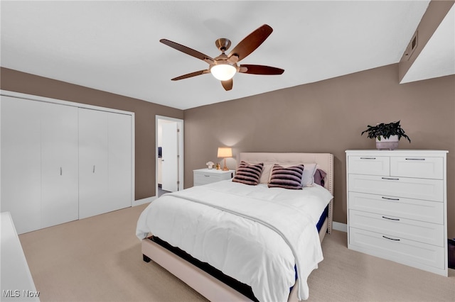 2910 N Bay Dr Unit L11, Westlake, OH 44145 - bedroom with light colored carpet, a closet, and ceiling fan