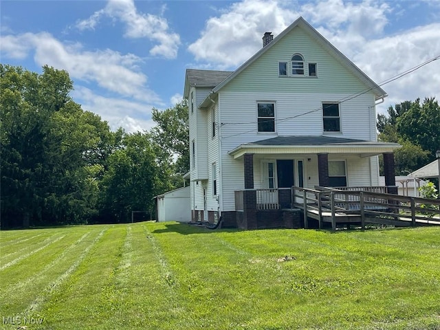 4034 Broadway Ave NE, Louisville, OH 44641 - view of front of property with covered porch, a front yard, and a chimney