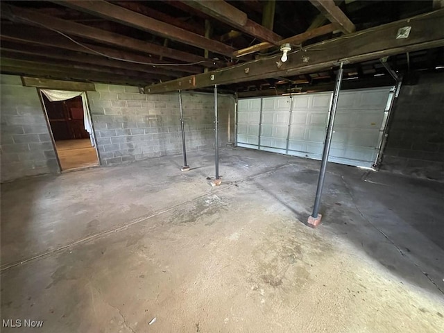 4034 Broadway Ave NE, Louisville, OH 44641 - below grade area featuring concrete block wall
