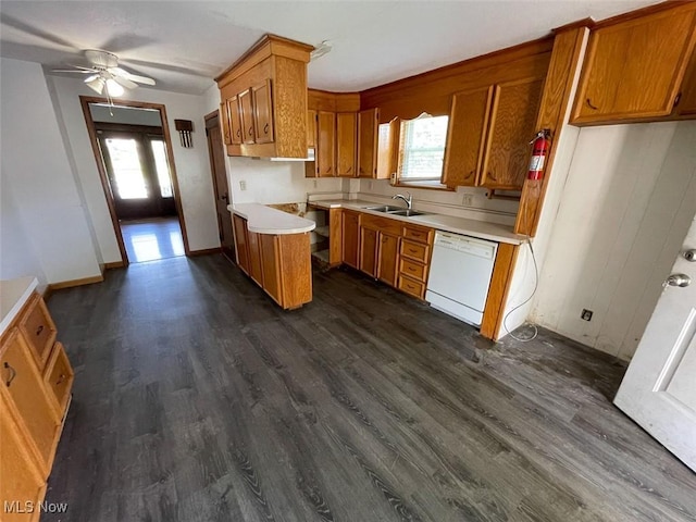 4034 Broadway Ave NE, Louisville, OH 44641 - kitchen featuring white dishwasher, brown cabinets, a ceiling fan, dark wood-style flooring, and plenty of natural light