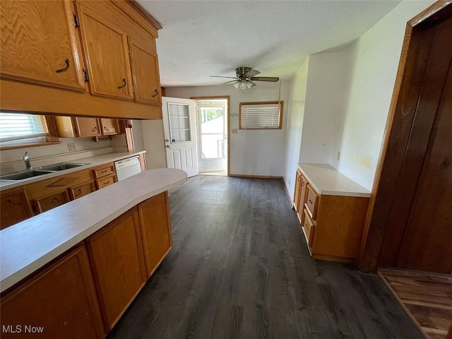 4034 Broadway Ave NE, Louisville, OH 44641 - kitchen featuring ceiling fan, brown cabinets, dark wood-type flooring, light countertops, and white dishwasher