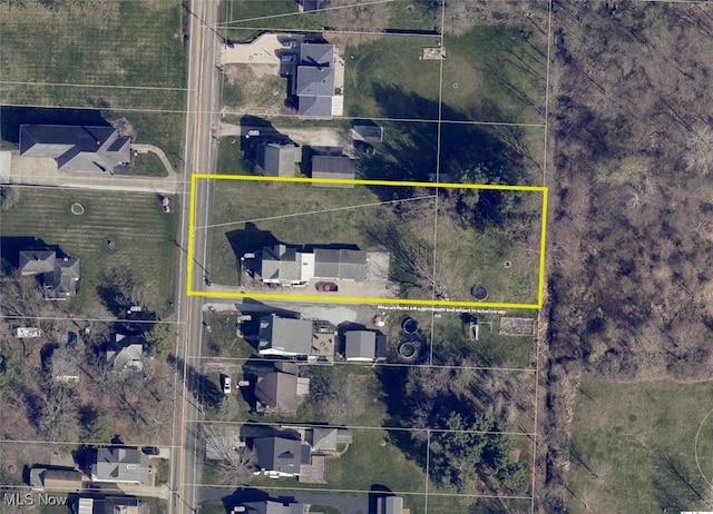 4034 Broadway Ave NE, Louisville, OH 44641 - aerial map of property and surrounding area with property boundaries highlighted