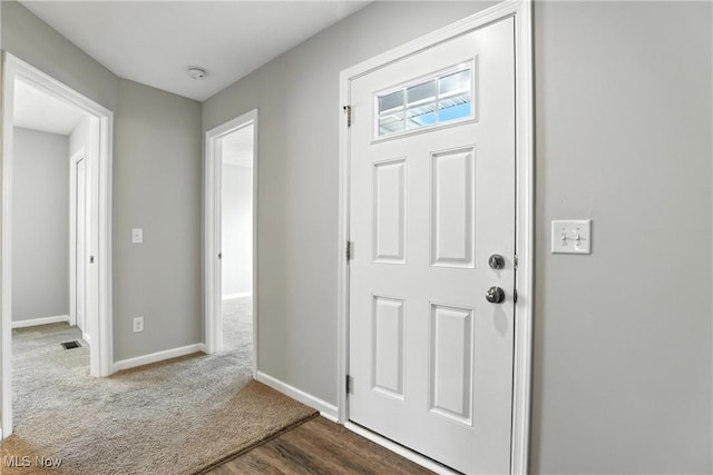 107 Lakeview Cir, Amherst, OH 44001 - foyer entrance with baseboards and wood finished floors