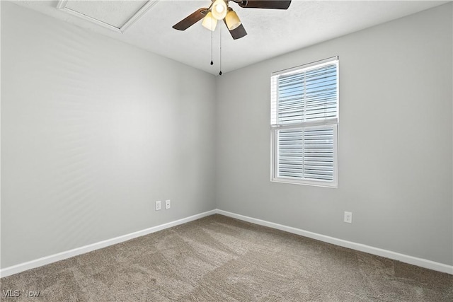 107 Lakeview Cir, Amherst, OH 44001 - carpeted empty room with baseboards and a ceiling fan