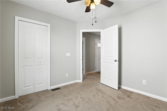 107 Lakeview Cir, Amherst, OH 44001 - unfurnished bedroom featuring carpet floors, a closet, and ceiling fan