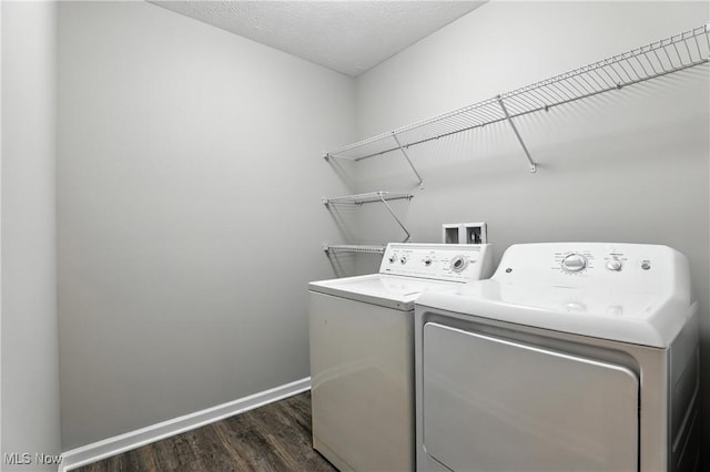 107 Lakeview Cir, Amherst, OH 44001 - laundry area with independent washer and dryer and dark wood finished floors