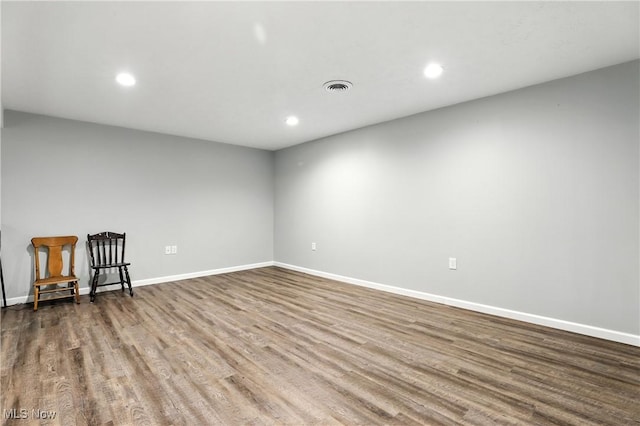 107 Lakeview Cir, Amherst, OH 44001 - empty room with wood finished floors and recessed lighting
