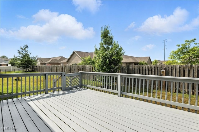 107 Lakeview Cir, Amherst, OH 44001 - wooden terrace featuring a fenced backyard and a residential view