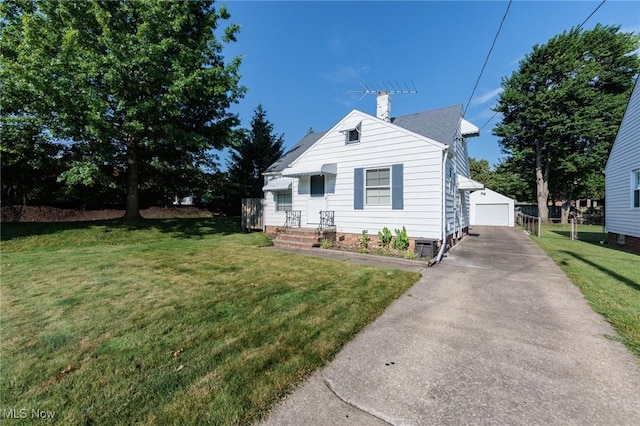 4766 Brookwood Dr, Brooklyn, OH 44144 - bungalow-style home with a chimney, an outbuilding, a detached garage, a front lawn, and driveway