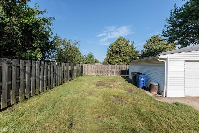 4766 Brookwood Dr, Brooklyn, OH 44144 - fenced backyard with a garage