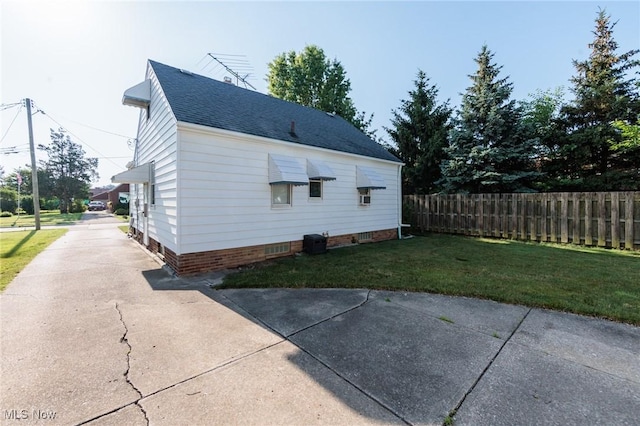 4766 Brookwood Dr, Brooklyn, OH 44144 - view of side of property featuring concrete driveway and roof with shingles