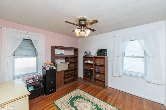 4766 Brookwood Dr, Brooklyn, OH 44144 - office with wood finished floors, a ceiling fan, and healthy amount of natural light