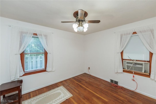 4766 Brookwood Dr, Brooklyn, OH 44144 - spare room featuring wood finished floors, ceiling fan, and cooling unit