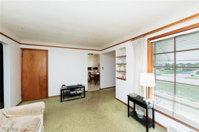 4766 Brookwood Dr, Brooklyn, OH 44144 - living area with light carpet and arched walkways