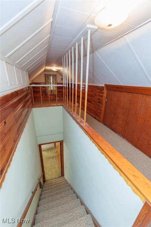 4766 Brookwood Dr, Brooklyn, OH 44144 - stairway featuring vaulted ceiling and carpet