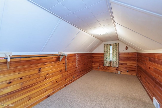 4766 Brookwood Dr, Brooklyn, OH 44144 - bonus room with wooden walls, carpet flooring, and vaulted ceiling