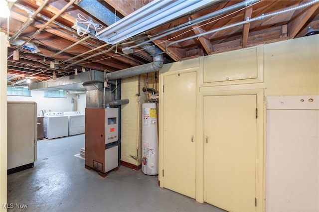 4766 Brookwood Dr, Brooklyn, OH 44144 - basement featuring gas water heater, washing machine and clothes dryer, heating unit, and fridge