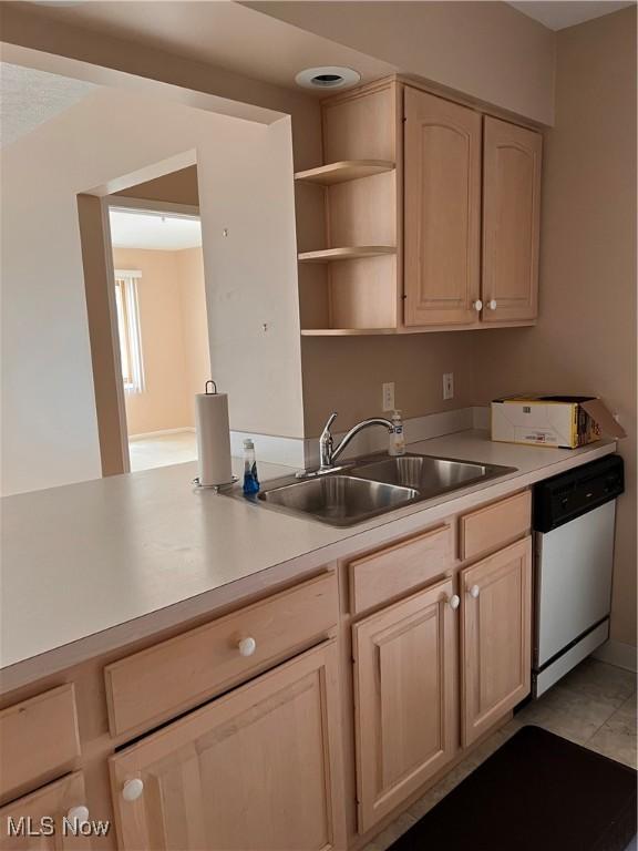 19510 Lorain Rd Unit 201, Fairview Park, OH 44126 - kitchen with dishwasher, light countertops, light brown cabinets, and open shelves