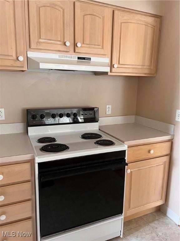 19510 Lorain Rd Unit 201, Fairview Park, OH 44126 - kitchen featuring white electric range oven, under cabinet range hood, light brown cabinetry, and light countertops