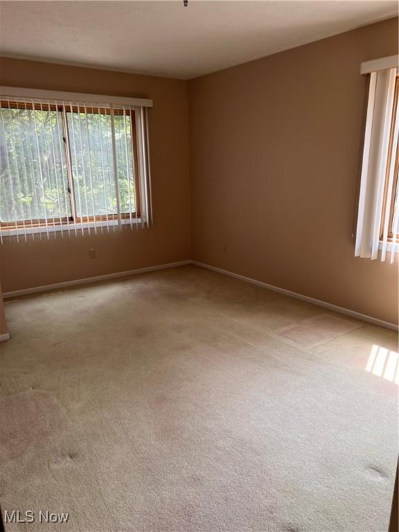 19510 Lorain Rd Unit 201, Fairview Park, OH 44126 - carpeted empty room with baseboards