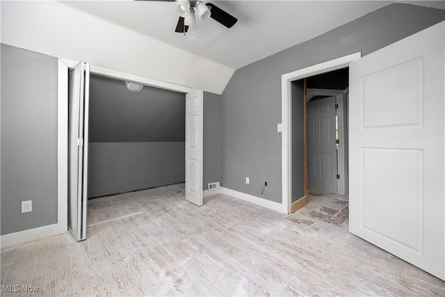 2922 Cory Ave, Akron, OH 44314 - unfurnished bedroom featuring vaulted ceiling, light wood-type flooring, a closet, and ceiling fan