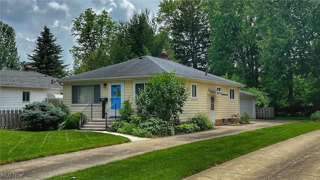 237 Kraft St, Berea, OH 44017 - view of front of house featuring concrete driveway and a garage