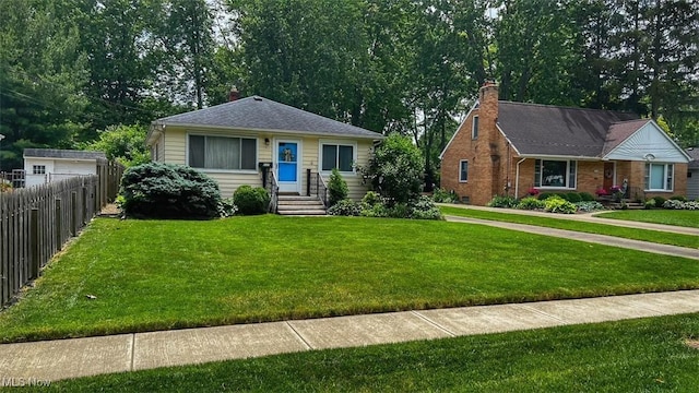 237 Kraft St, Berea, OH 44017 - view of front facade featuring a chimney