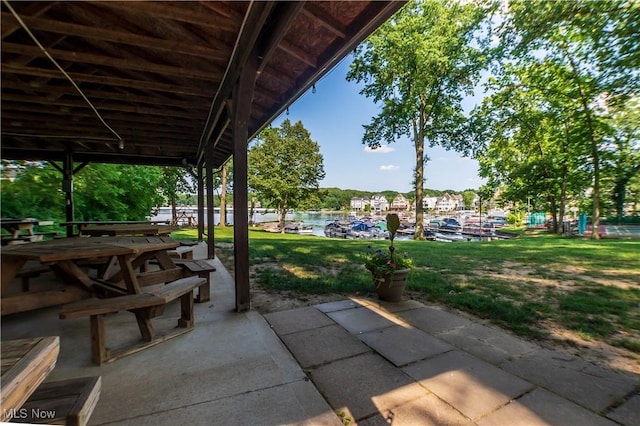 216 W Glenridge Rd, Green, OH 44319 - view of patio / terrace with a water view