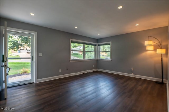 216 W Glenridge Rd, Green, OH 44319 - spare room with dark wood-type flooring and recessed lighting