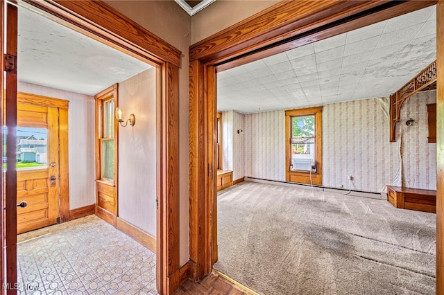 13778 Spring St, Burton, OH 44021 - hall featuring wallpapered walls and a baseboard heating unit