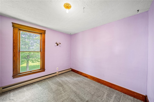 13778 Spring St, Burton, OH 44021 - empty room featuring a baseboard radiator, carpet flooring, and a textured ceiling