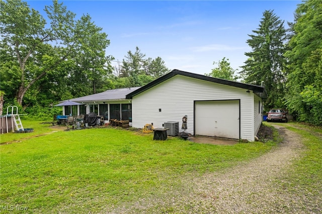 8902 Taylor May Rd, Chagrin Falls, OH 44023 - back of property featuring driveway and a yard