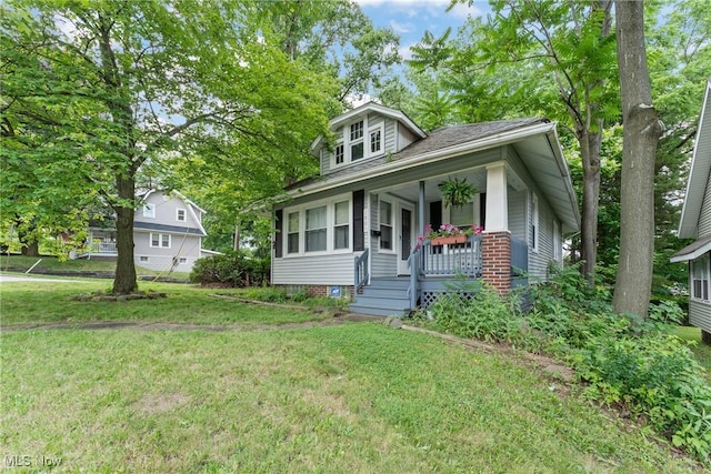 1901 Newton St, Akron, OH 44305 - bungalow-style house featuring a porch and a front yard