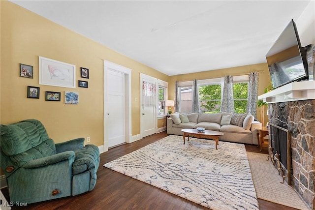 1901 Newton St, Akron, OH 44305 - living area featuring dark wood-style flooring and a fireplace